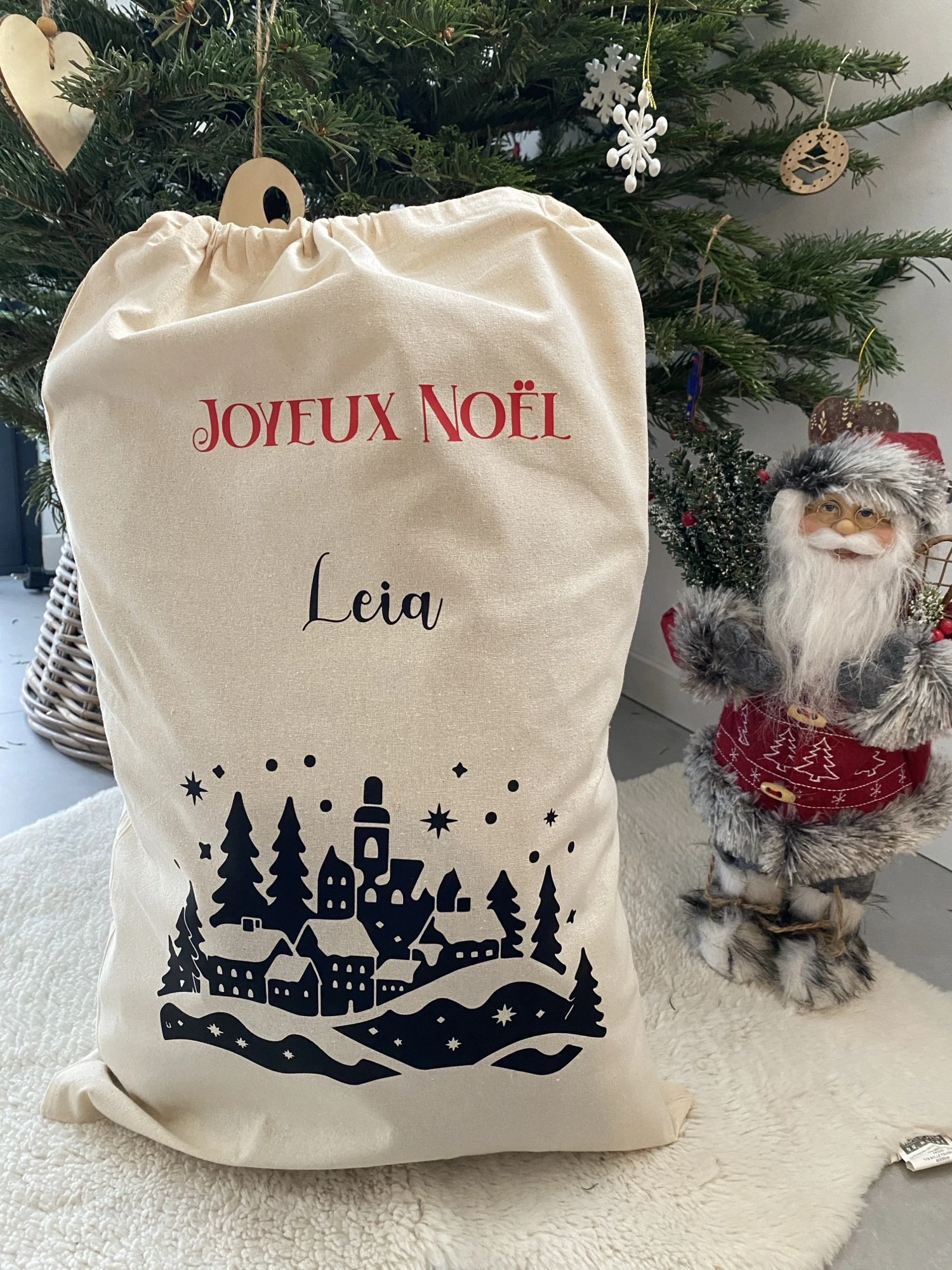 hotte noel personnalisée village